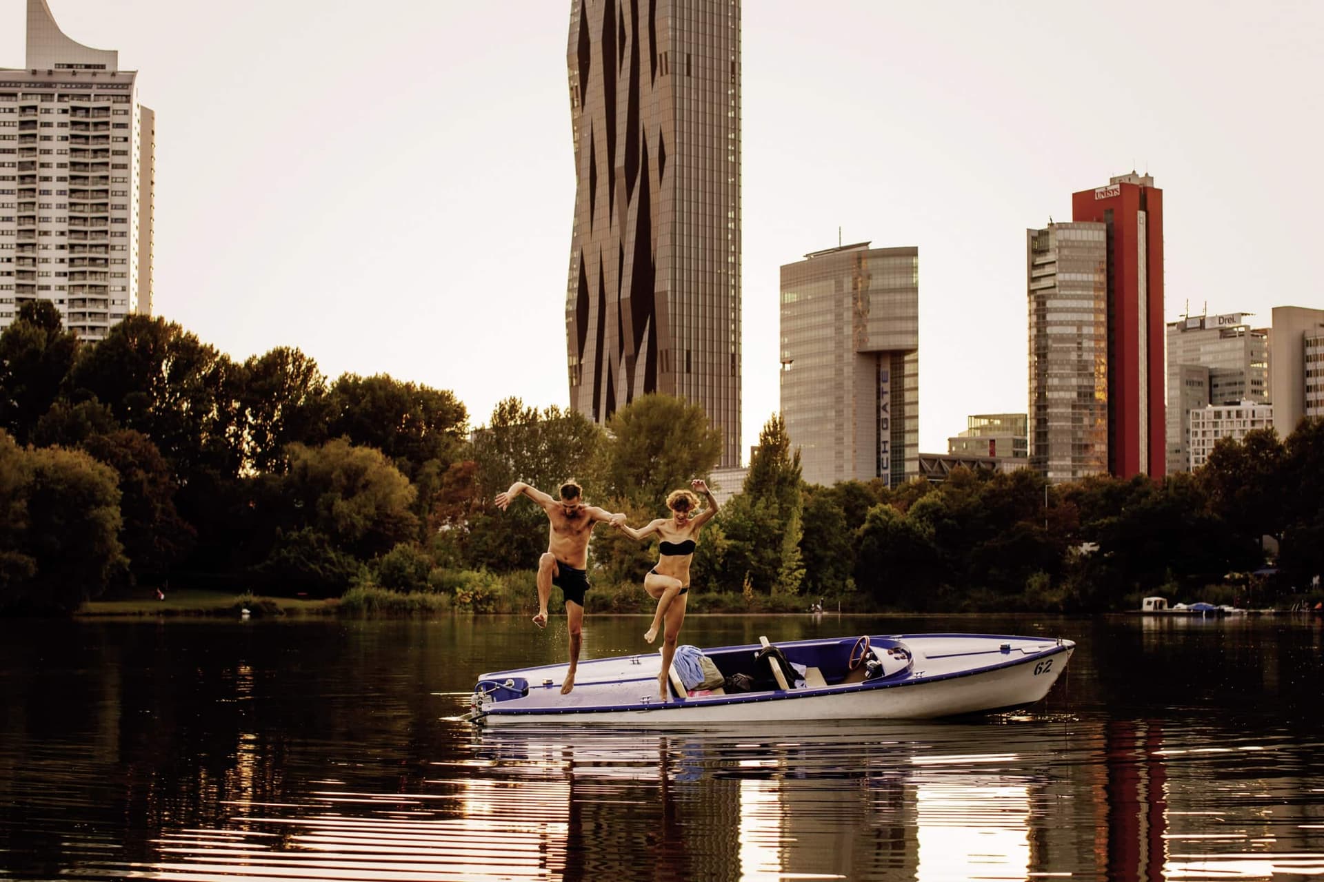 Boat and swimmers on Vienna’s Alte Donau